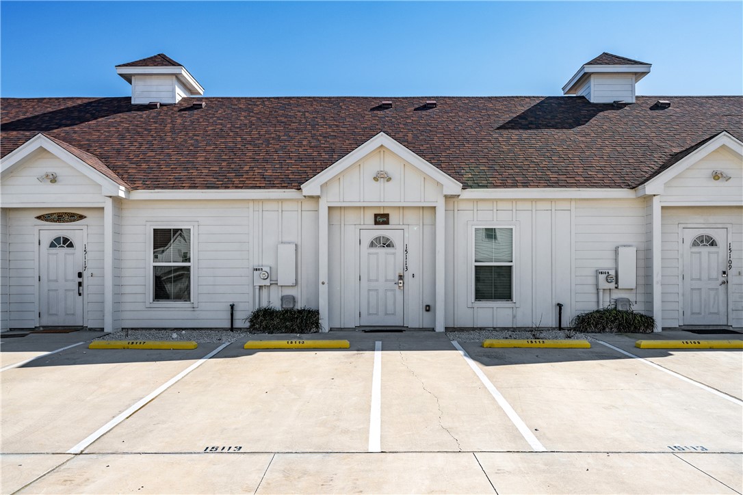 a front view of a house with swimming pool