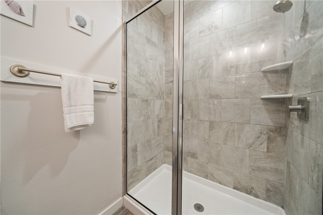 15113 Kokomo Drive Corpus Christi, TX 78418 - Photo 13 of 25 a bathroom with a shower
