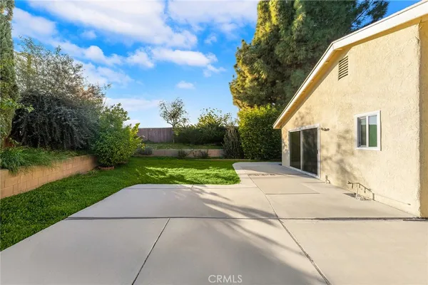 a view of backyard with green space