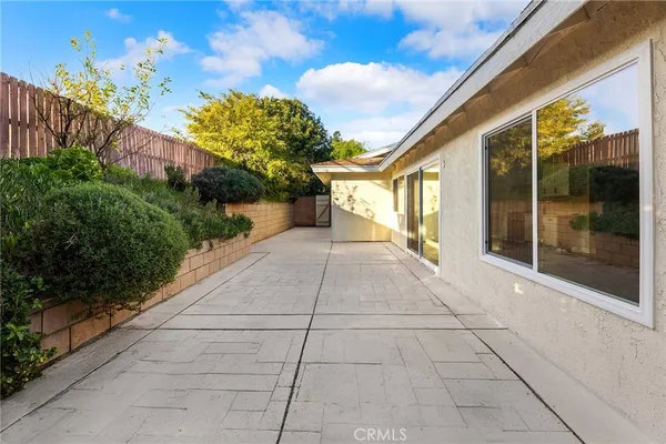 a view of a back yard of the house