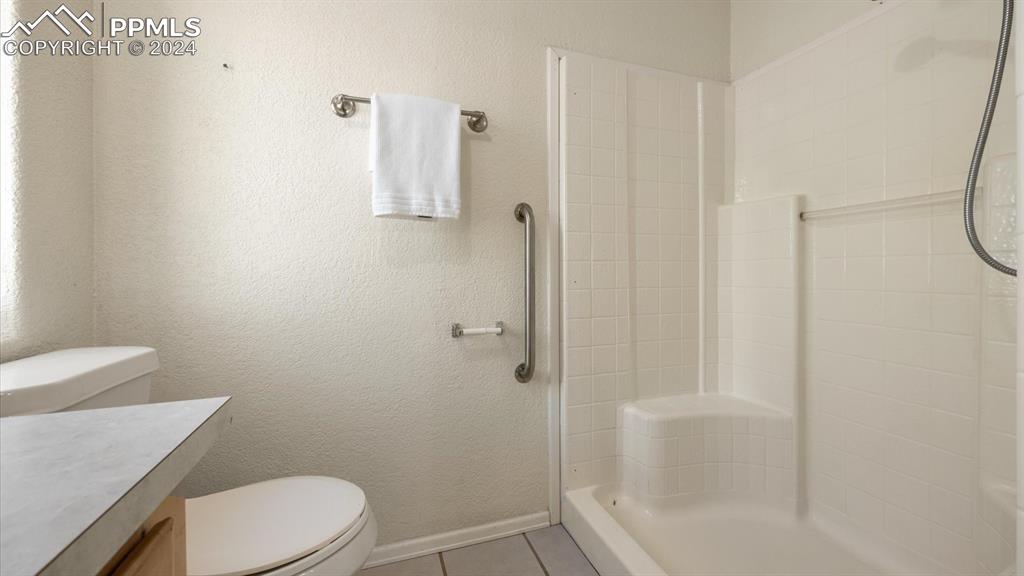 36925 Shear Road Yoder, CO 80864 - Photo 21 of 34 a bathroom with a toilet and shower