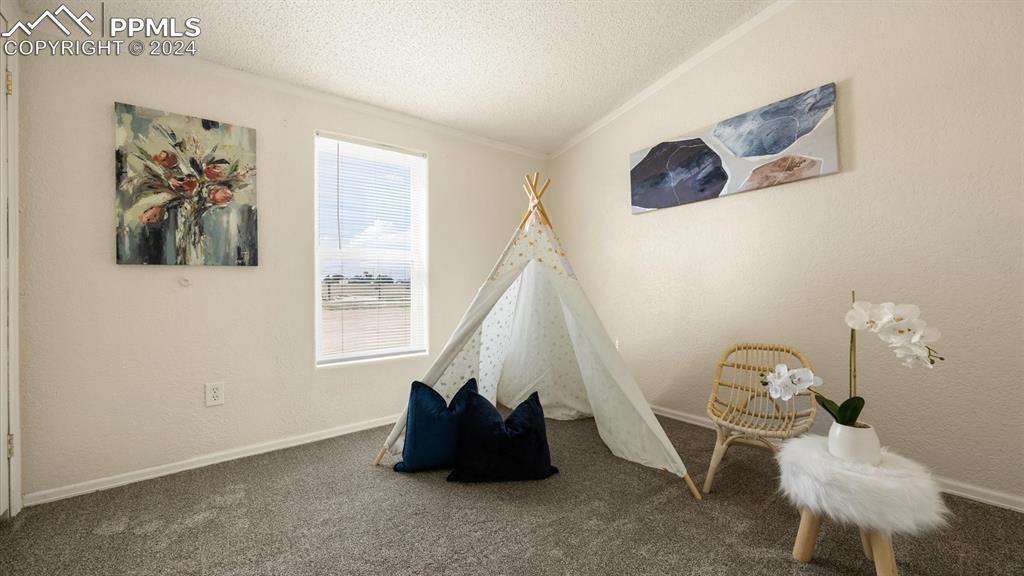 36925 Shear Road Yoder, CO 80864 - Photo 25 of 34 a room with a window and couch