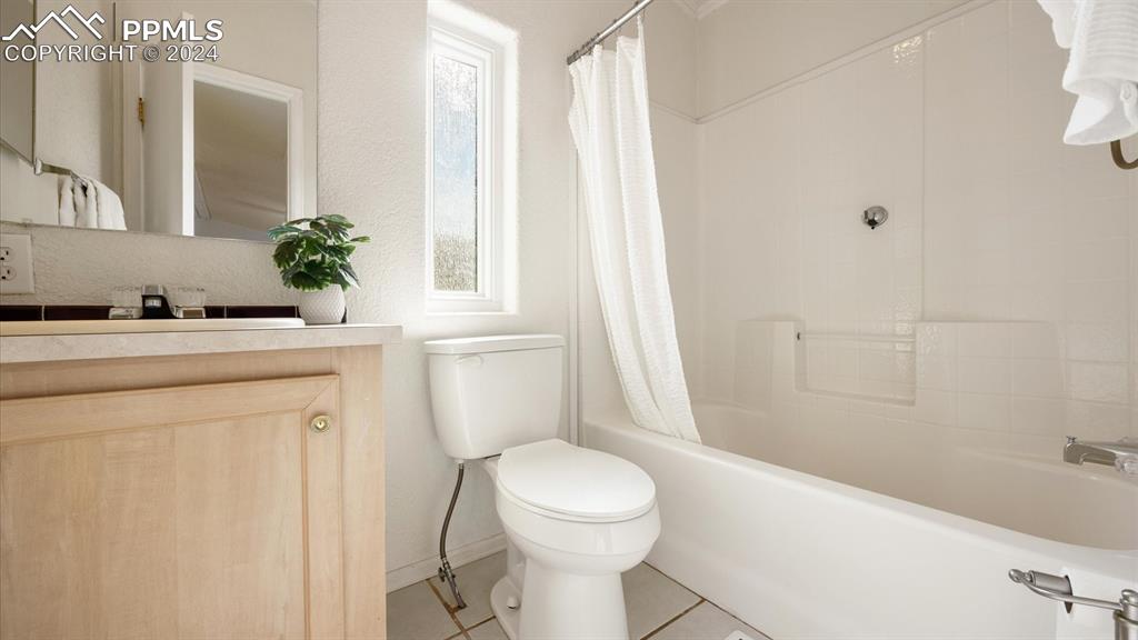 36925 Shear Road Yoder, CO 80864 - Photo 26 of 34 a bathroom with a sink a toilet and shower