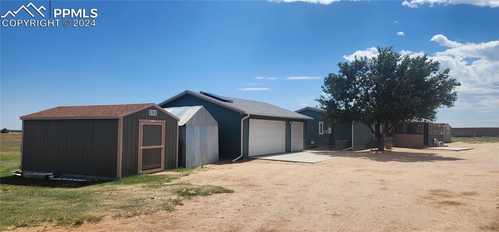 36925 Shear Road Yoder, CO 80864 - Photo 3 of 34 a view of a house with a yard