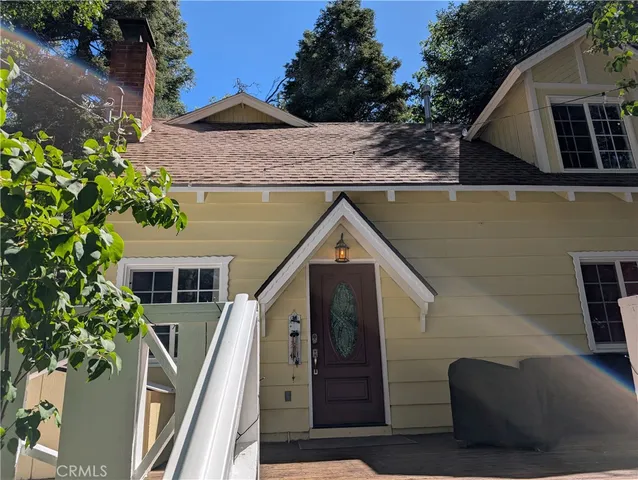 a aerial view of a house with a yard