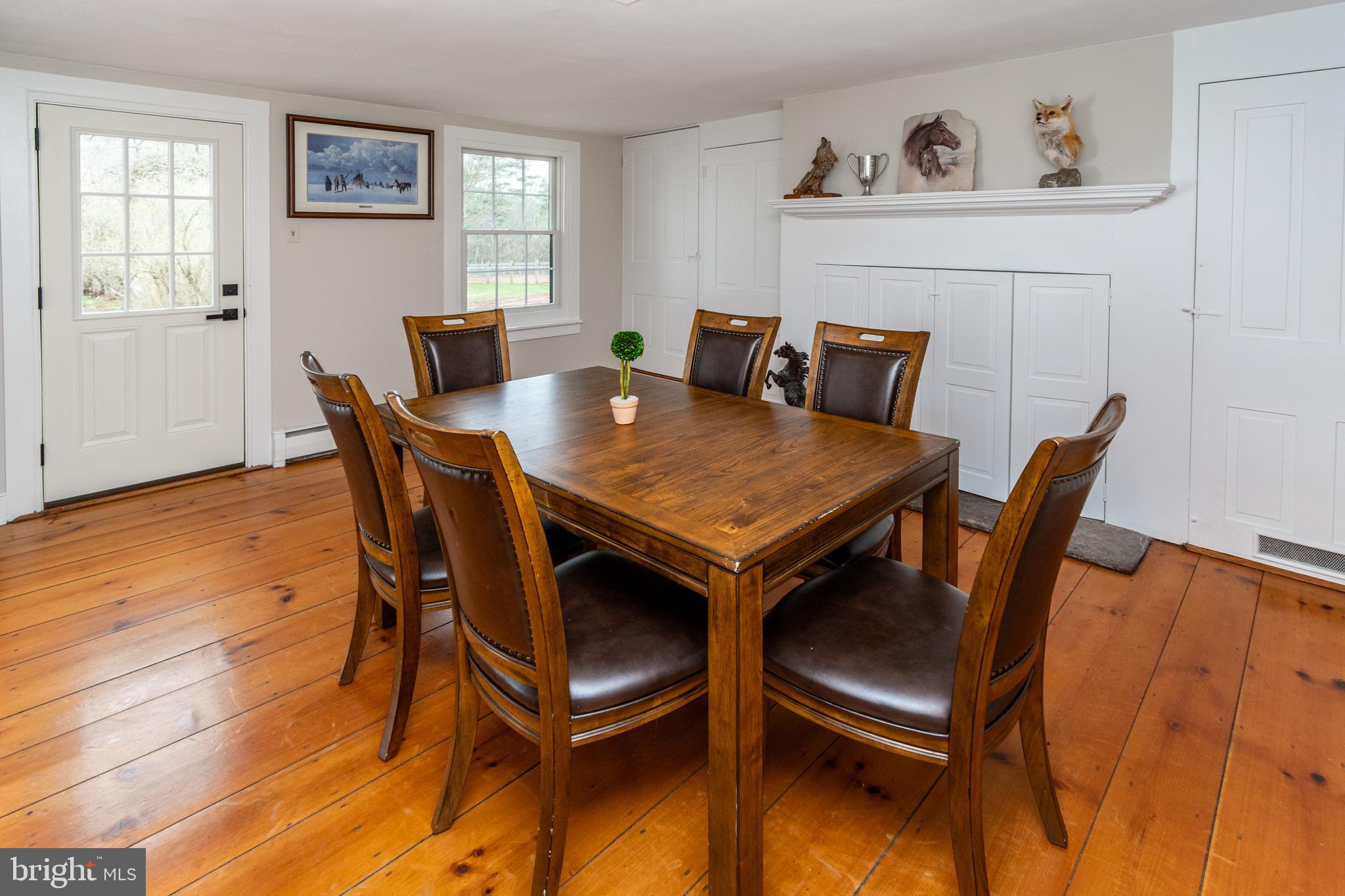 180 Municipal Road Pipersville, PA 18947 - Photo 31 of 60 a view of a dining room with furniture and wooden floor