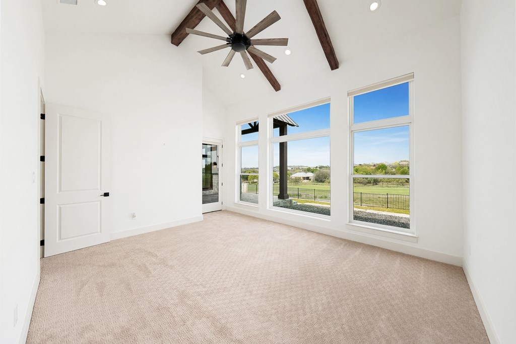 1029 Club House Road Kerrville, TX 78028 - Photo 23 of 62 a view of an empty room with a window