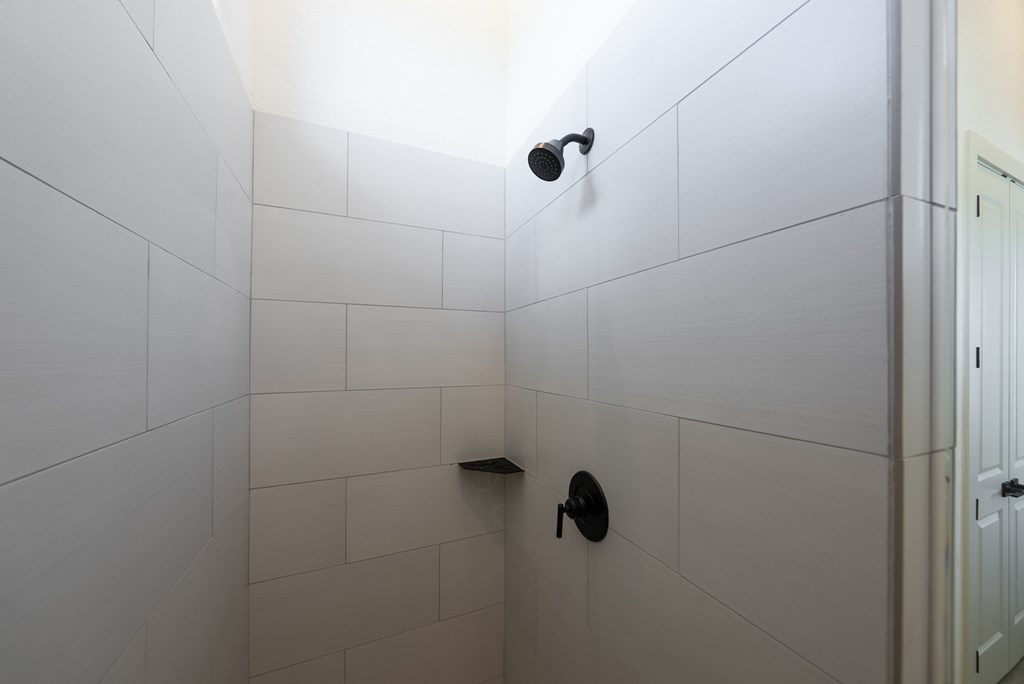 1029 Club House Road Kerrville, TX 78028 - Photo 35 of 62 a bathroom with a shower