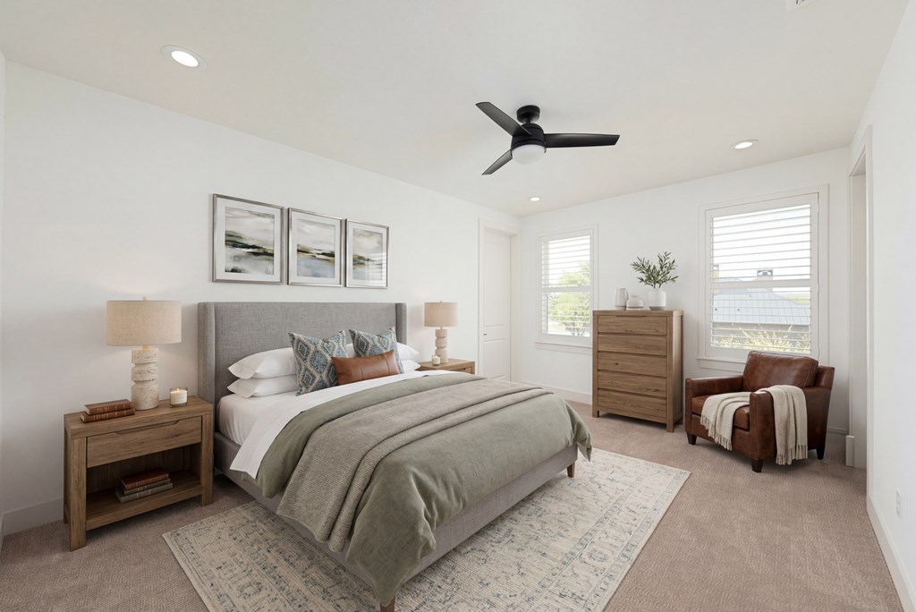 1029 Club House Road Kerrville, TX 78028 - Photo 36 of 62 a bedroom with a bed and ceiling fan