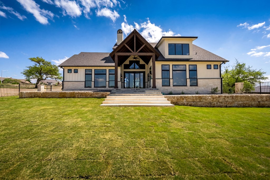 1029 Club House Road Kerrville, TX 78028 - Photo 55 of 62 a front view of a house with swimming pool