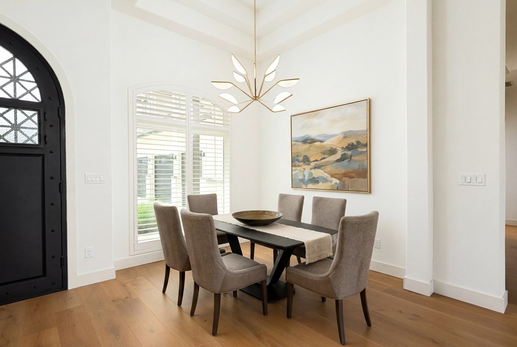 1029 Club House Road Kerrville, TX 78028 - Photo 6 of 62 a dining room with furniture and window