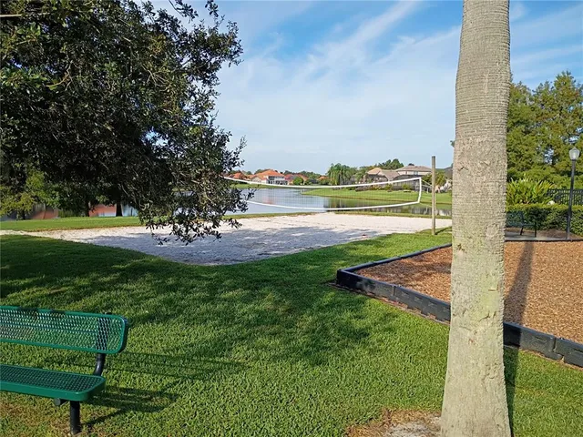 a view of a garden and lake