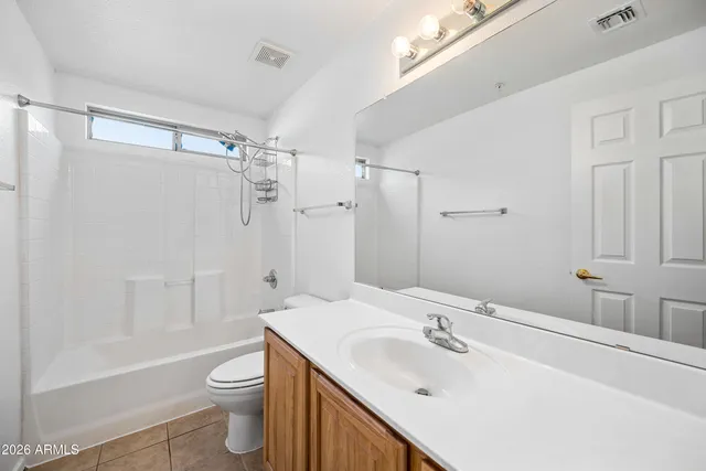 a view of storage and utility room with washer and dryer