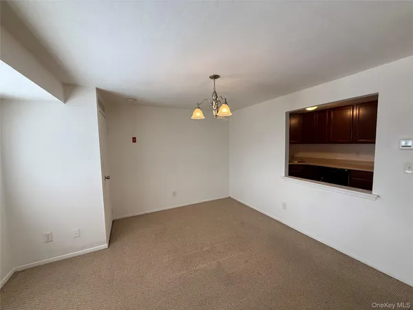 a view of a livingroom with furniture