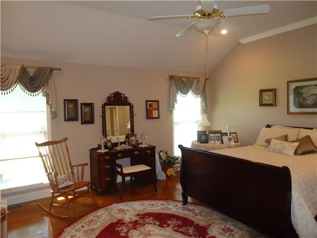 30724 Mill Race Road Ardmore, TN 38449 - Photo 10 of 20 Master Bedroom - Hardwood flooring, recessed lighting, vaulted ceiling and crown molding.