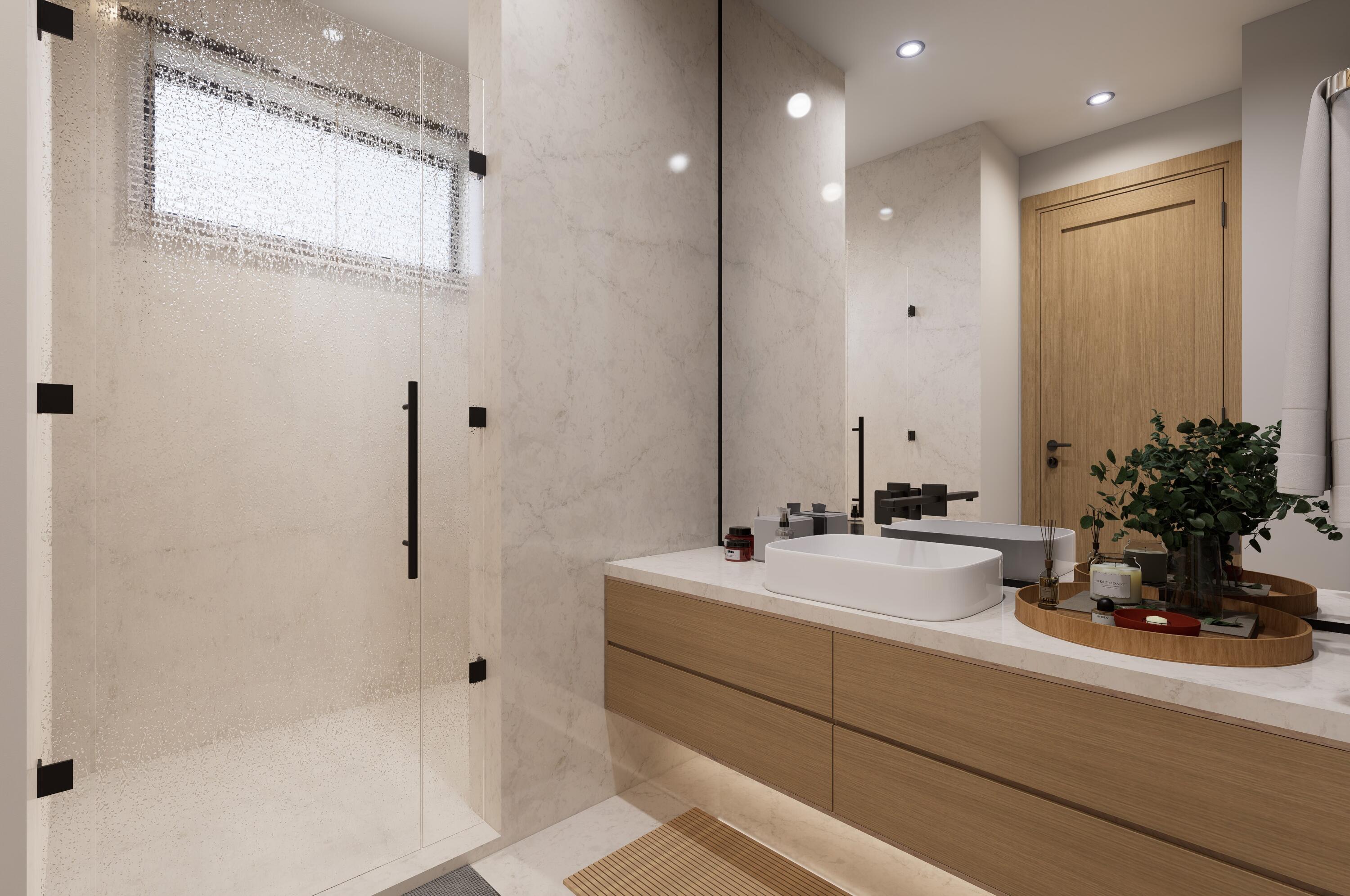 1160 Emerald Lane Singer Island, FL 33404 - Photo 37 of 37 a bathroom with a sink and a mirror