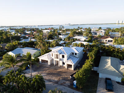 1160 Emerald Lane Singer Island, FL 33404 - Photo 6 of 37 an aerial view of a house with a lake view