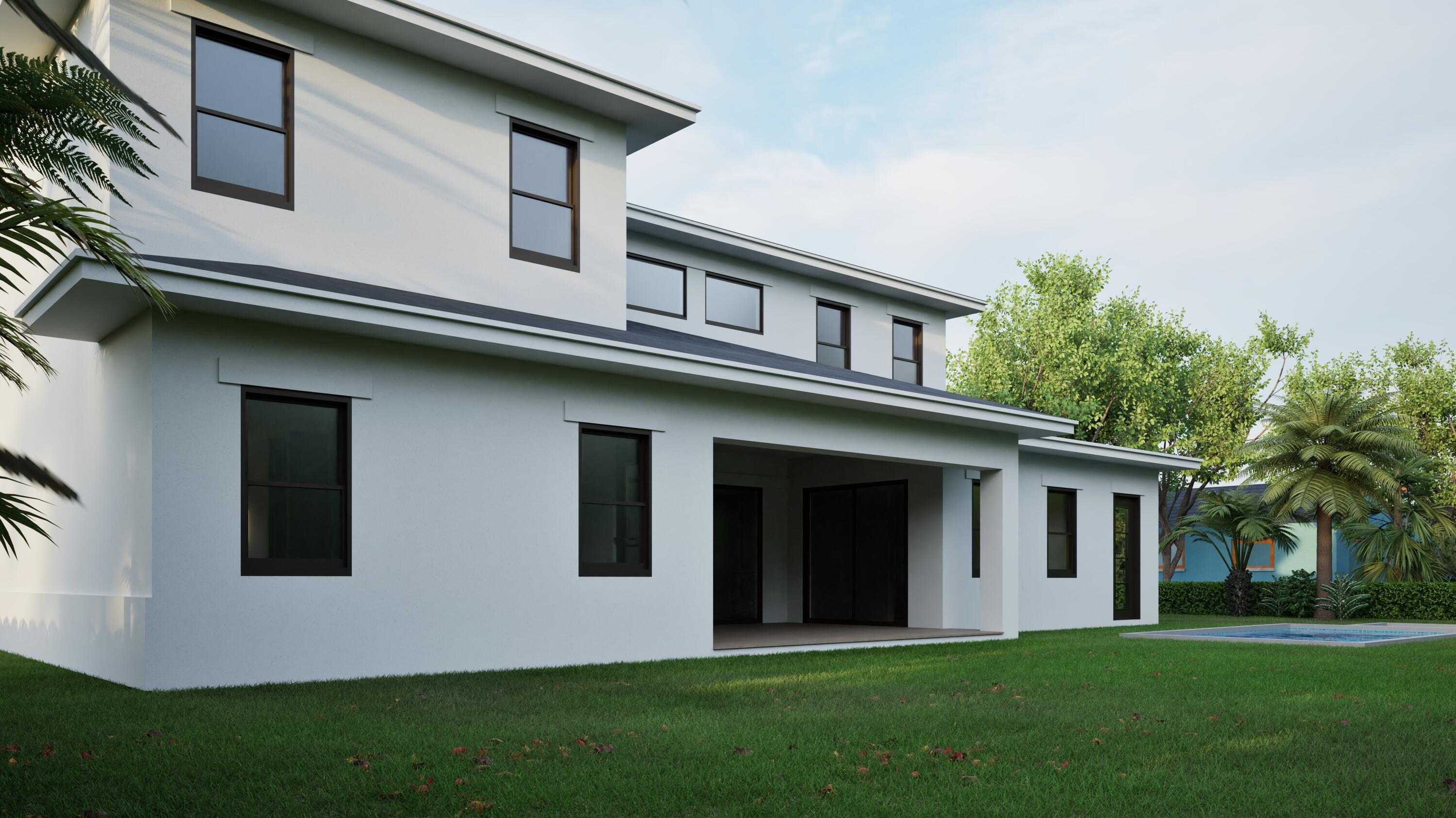 1160 Emerald Lane Singer Island, FL 33404 - Photo 10 of 37 a front view of a house with a garden