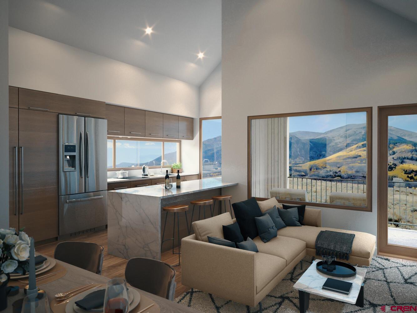 161 Elk Valley Road, Unit A Crested Butte, CO 81224 - Photo 2 of 8 a living room with furniture and a large window