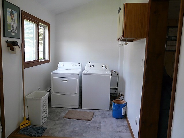 26325 West Central Road Ingleside, IL 60041 - Photo 12 of 18 a view of storage and utility room with a sink washer and dryer