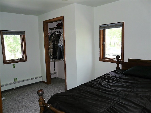 26325 West Central Road Ingleside, IL 60041 - Photo 15 of 18 a bedroom with a bed and a window