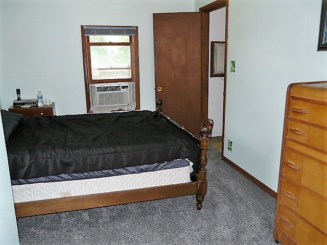 26325 West Central Road Ingleside, IL 60041 - Photo 16 of 18 a bedroom with a bed and a window
