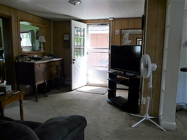 26325 West Central Road Ingleside, IL 60041 - Photo 6 of 18 a living room with furniture and a flat screen tv