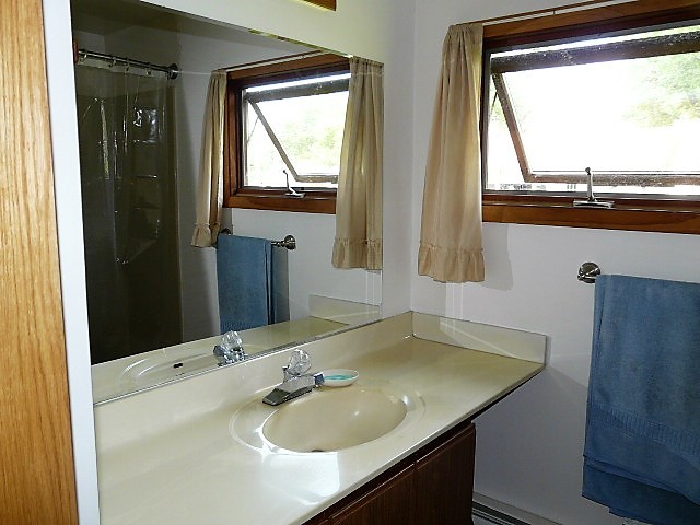 26325 West Central Road Ingleside, IL 60041 - Photo 10 of 18 a bathroom with a granite countertop sink vanity and a mirror