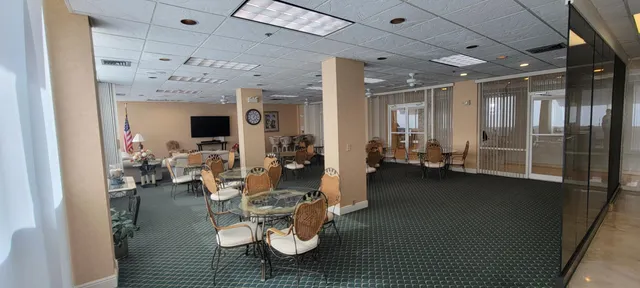 a living room with lots of furniture and a flat screen tv