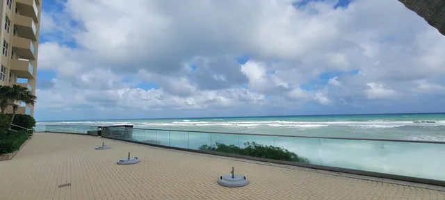 a terrace of a house with outdoor seating
