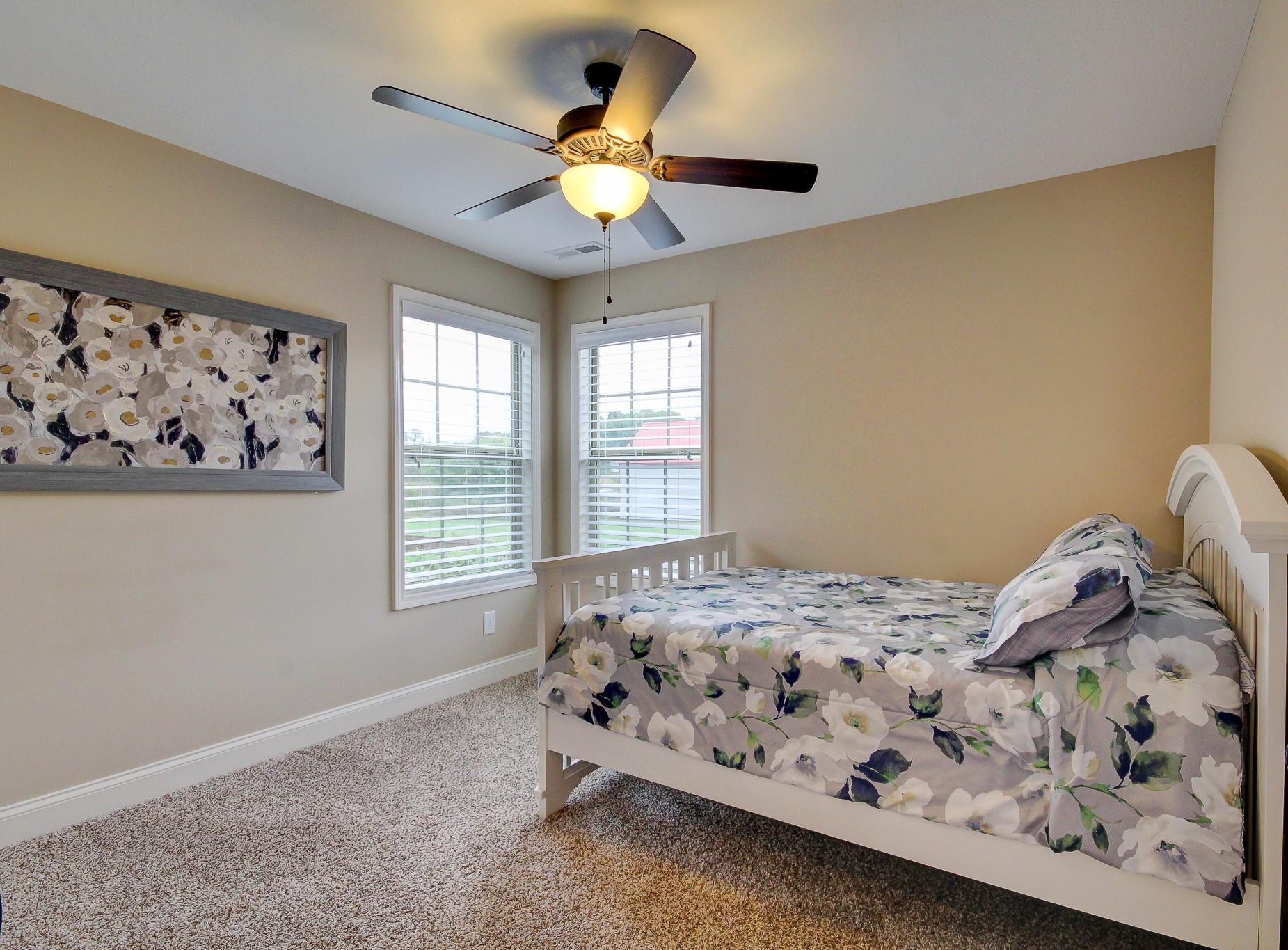 1012 Barnhill Road Clarksville, TN 37043 - Photo 11 of 18 a bedroom with a bed and a window