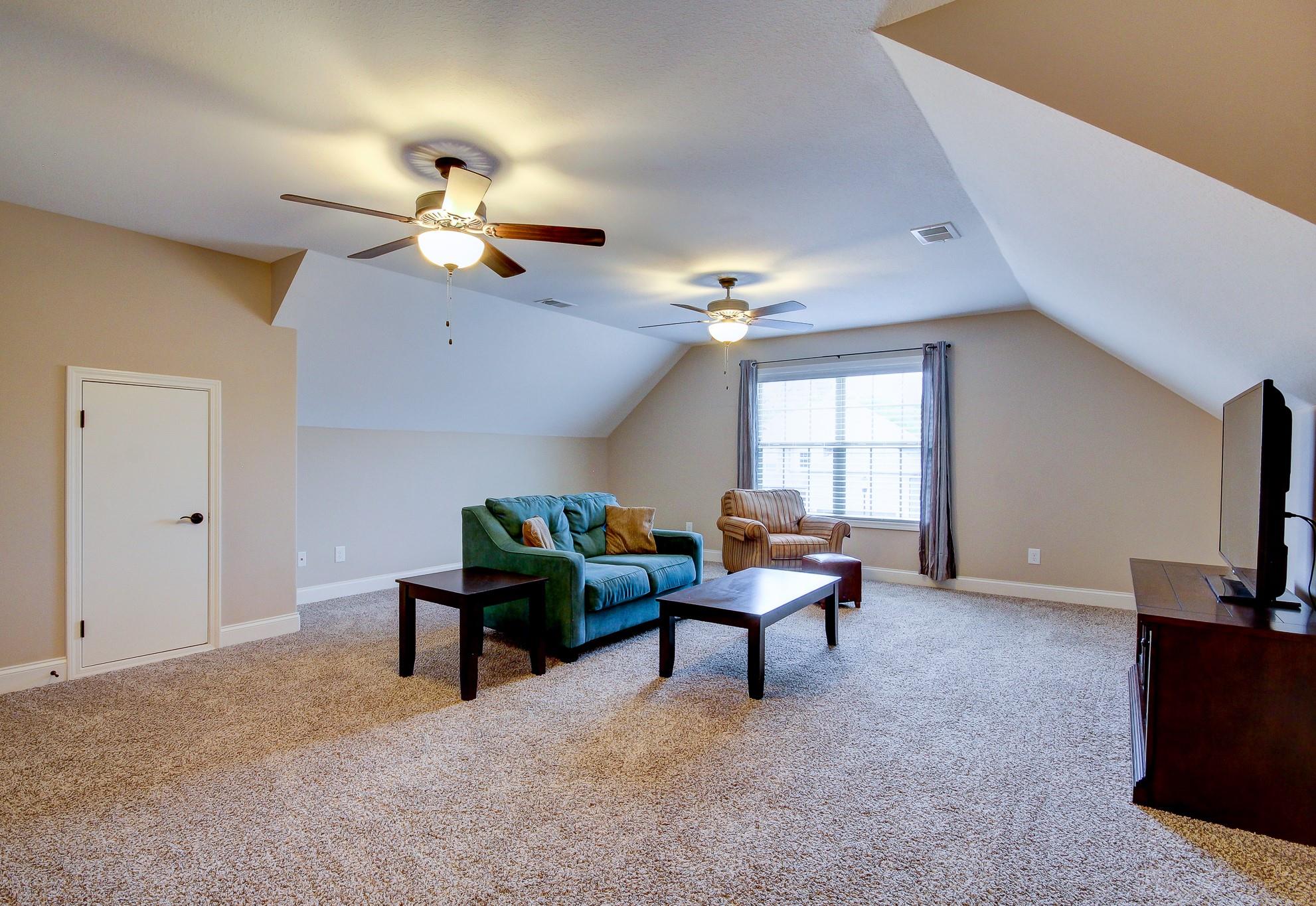 1012 Barnhill Road Clarksville, TN 37043 - Photo 13 of 18 a living room with furniture and a flat screen tv