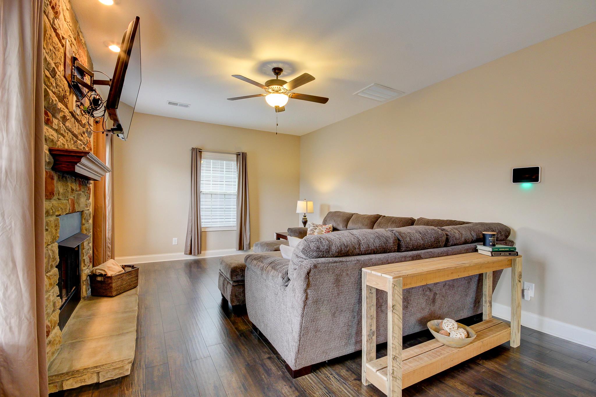 1012 Barnhill Road Clarksville, TN 37043 - Photo 5 of 18 a living room with furniture and a chandelier