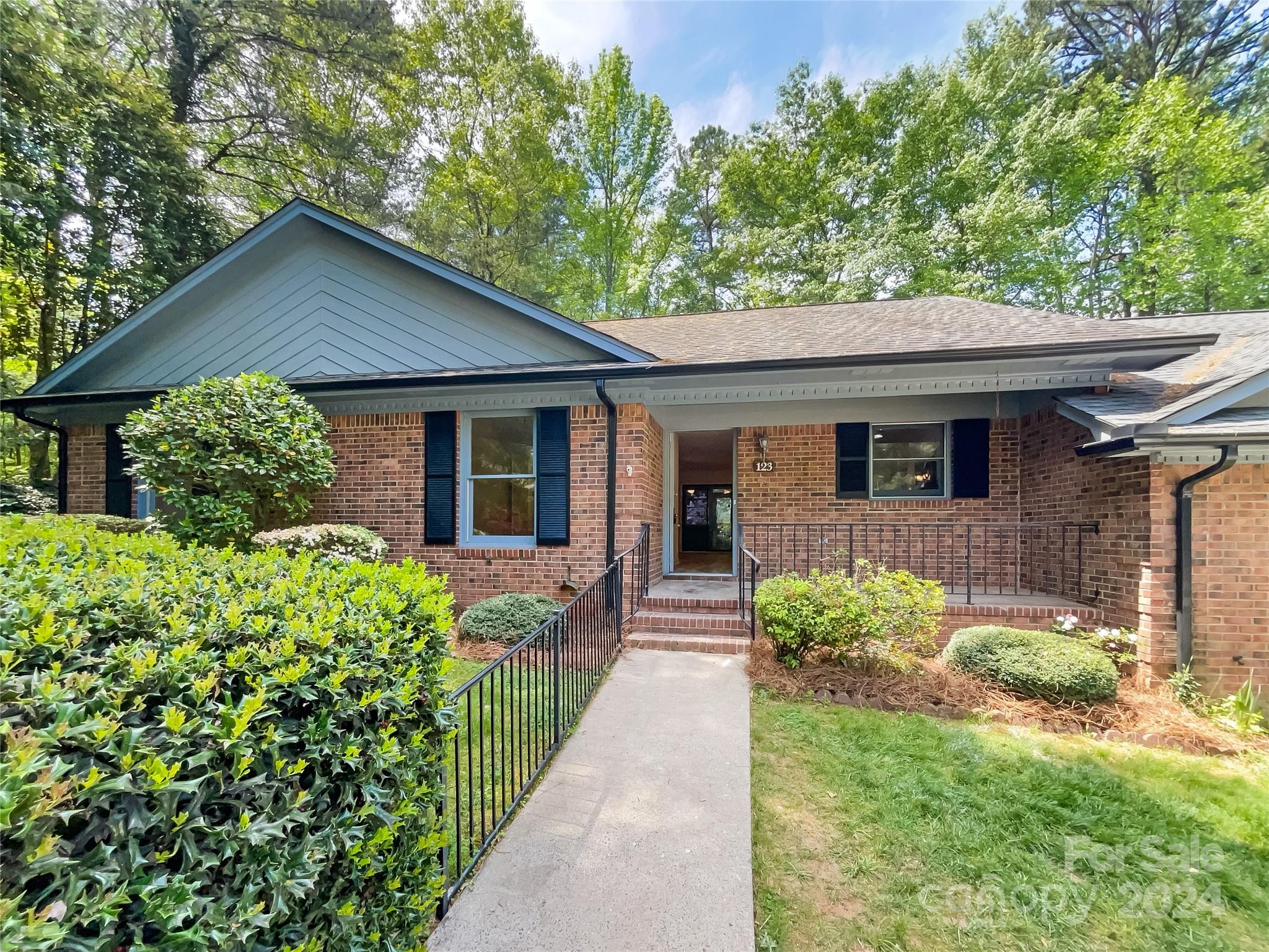 123 David Court Fort Mill, SC 29715 - Photo 1 of 18 a front view of a house with a yard and porch