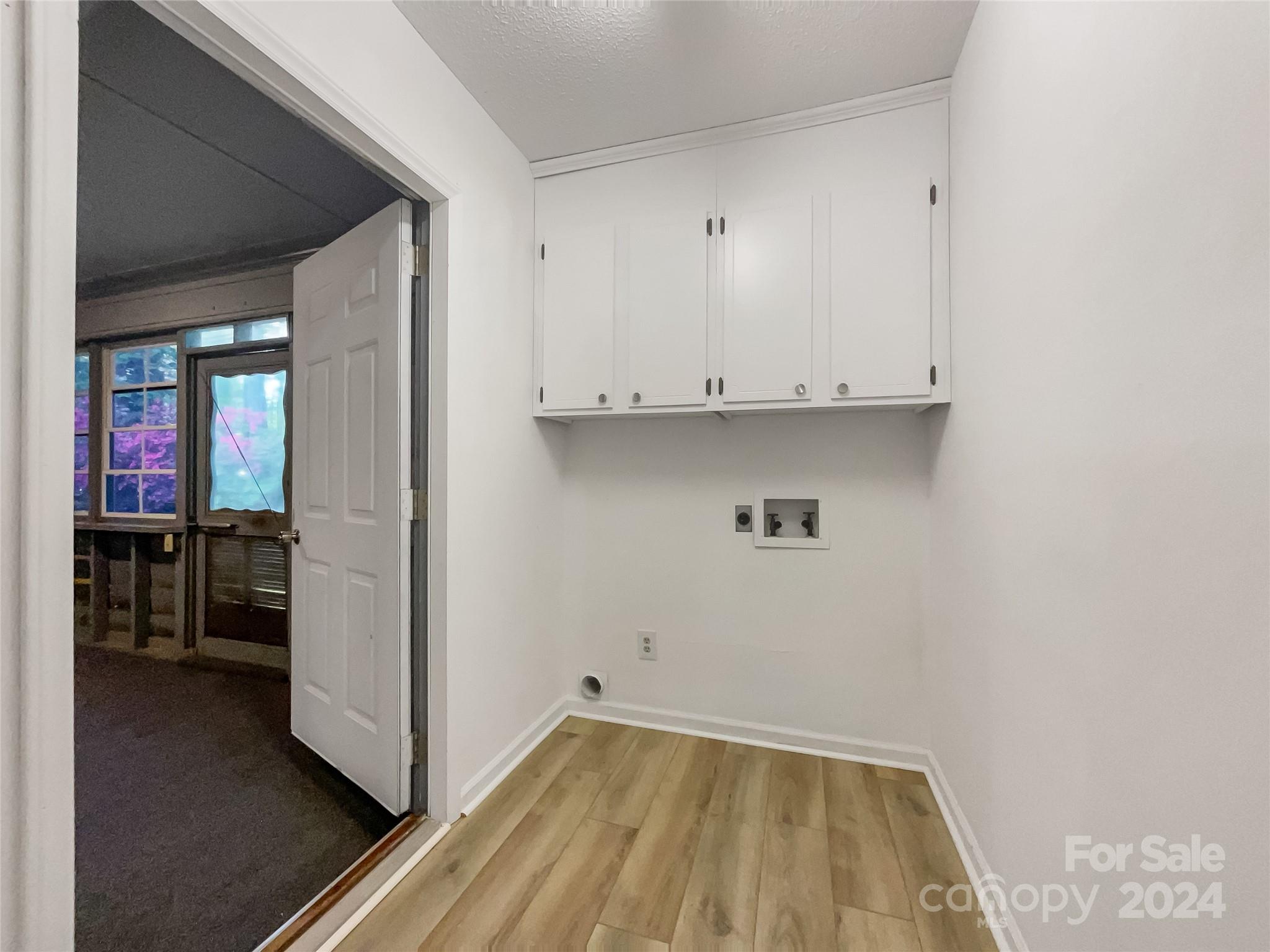 123 David Court Fort Mill, SC 29715 - Photo 18 of 18 a view of walk in closet with wooden floor