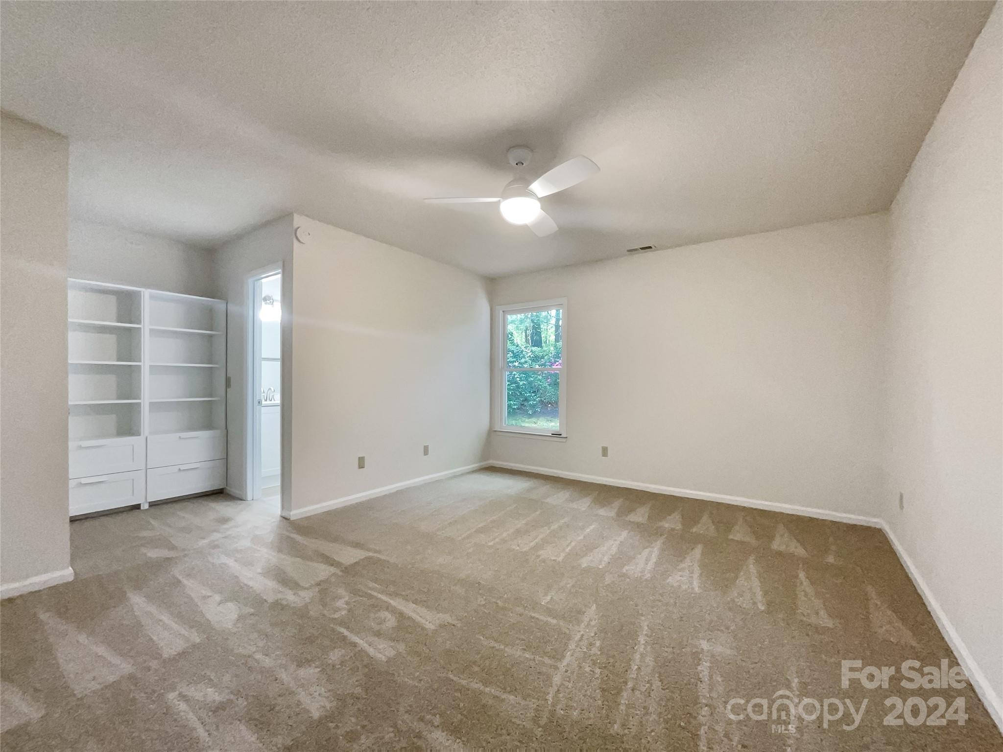 123 David Court Fort Mill, SC 29715 - Photo 5 of 18 an empty room with a empty space and window