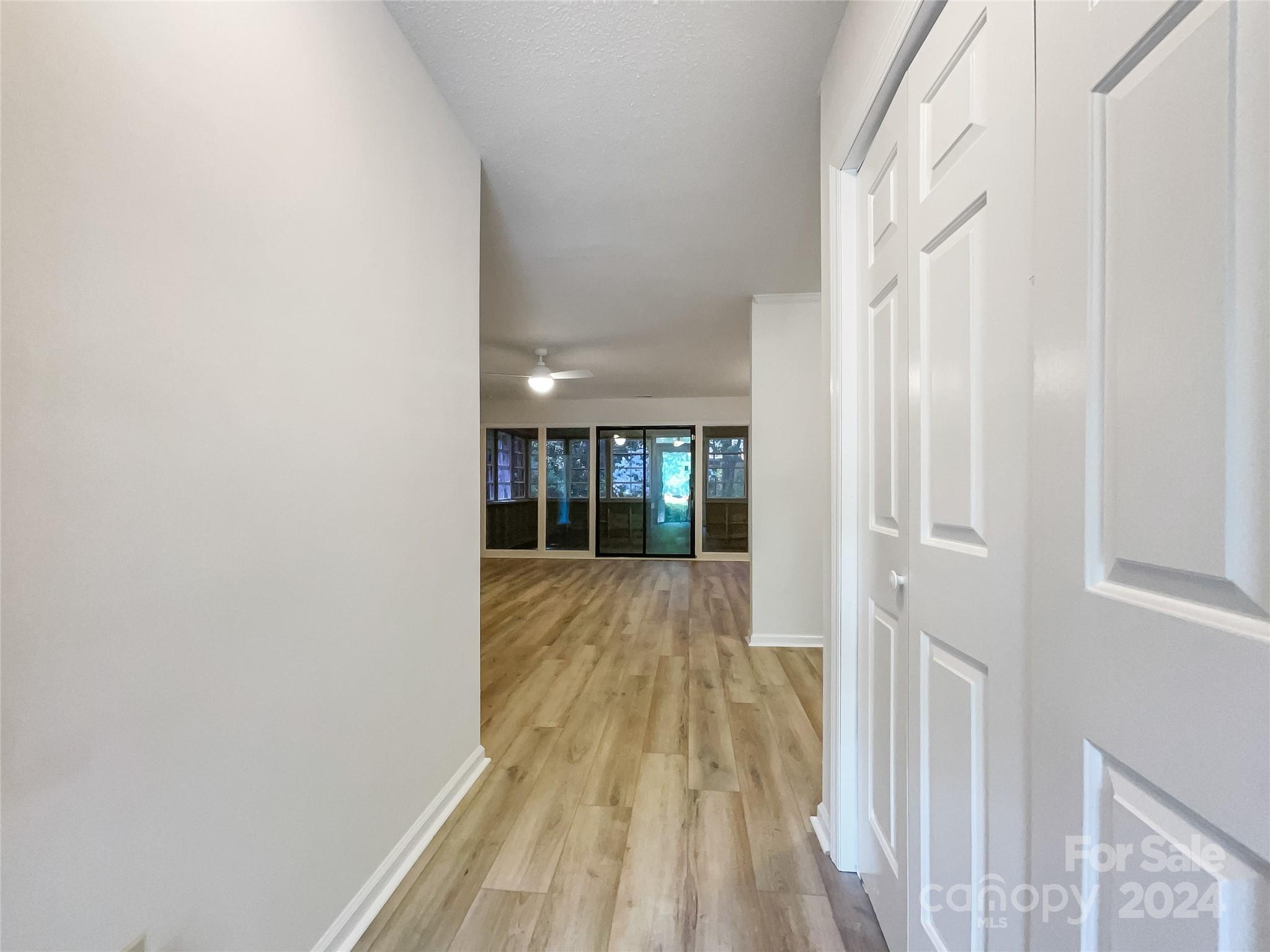 123 David Court Fort Mill, SC 29715 - Photo 10 of 18 a view of a room with wooden floor and fence