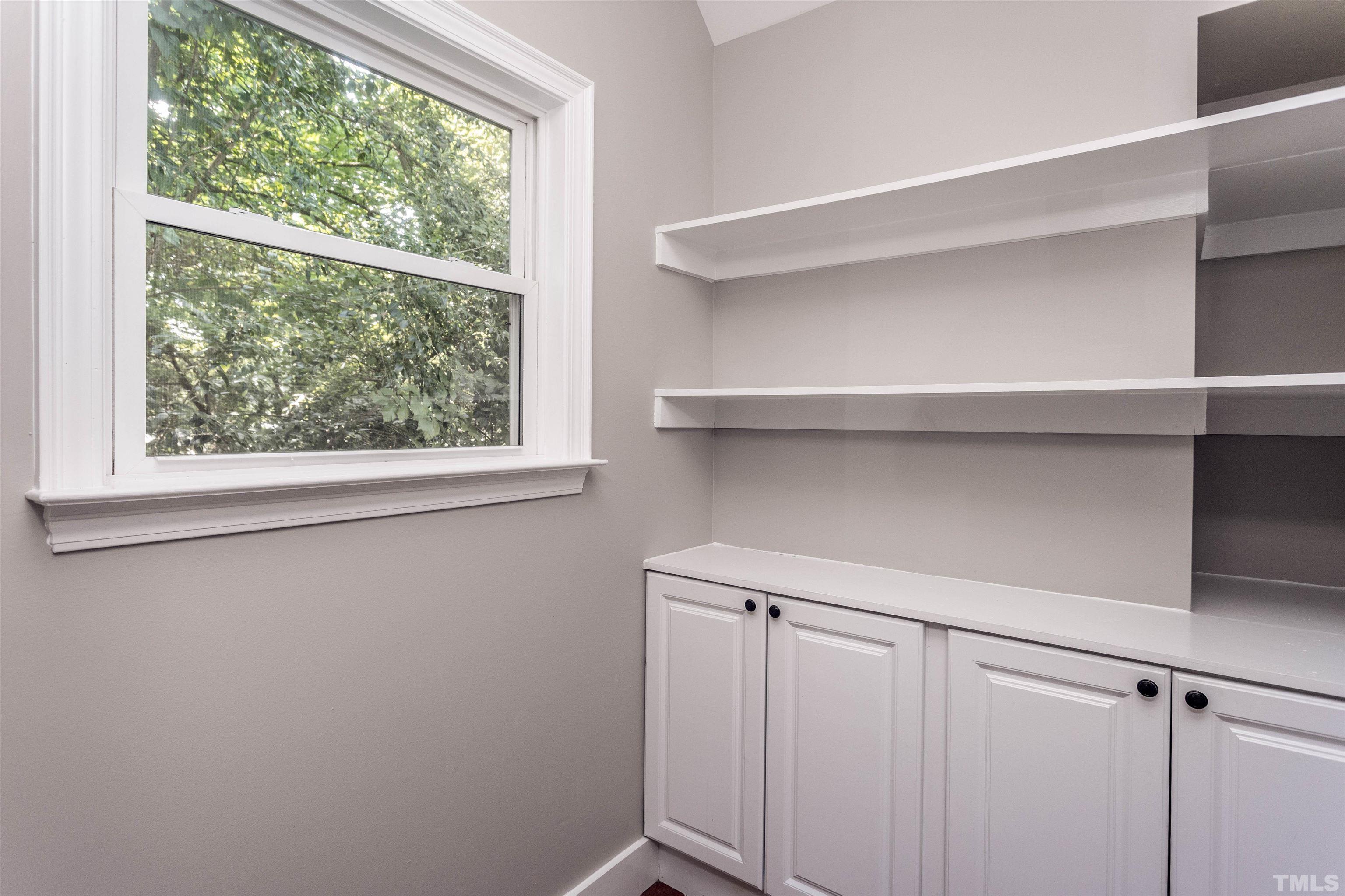 312 Freeman Street Raleigh, NC 27601 - Photo 12 of 30 a view of a closet with wooden floor