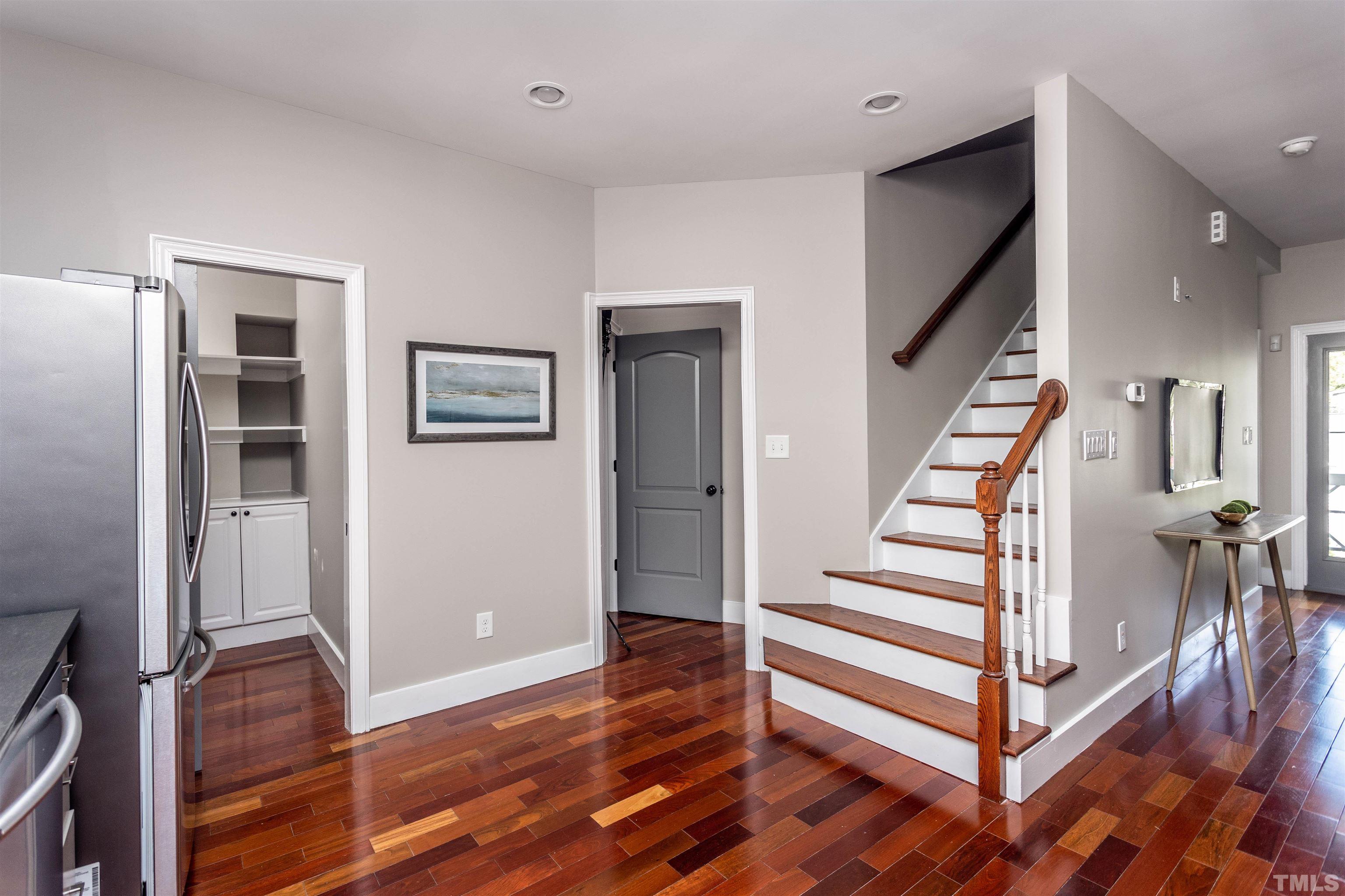 312 Freeman Street Raleigh, NC 27601 - Photo 10 of 30 a view of entryway and hall with wooden floor