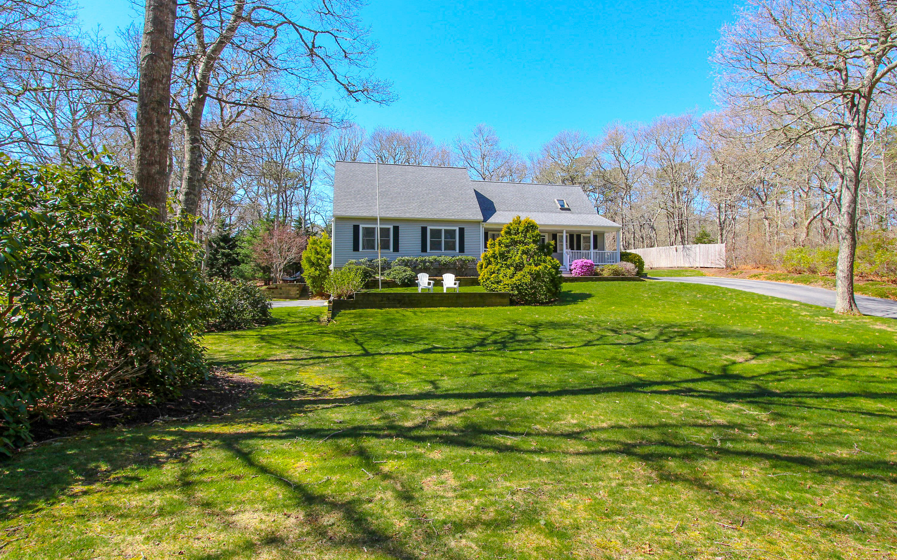 49 Suomi Road Hyannis, MA 02601 - Photo 5 of 59 a front view of house with yard and green space