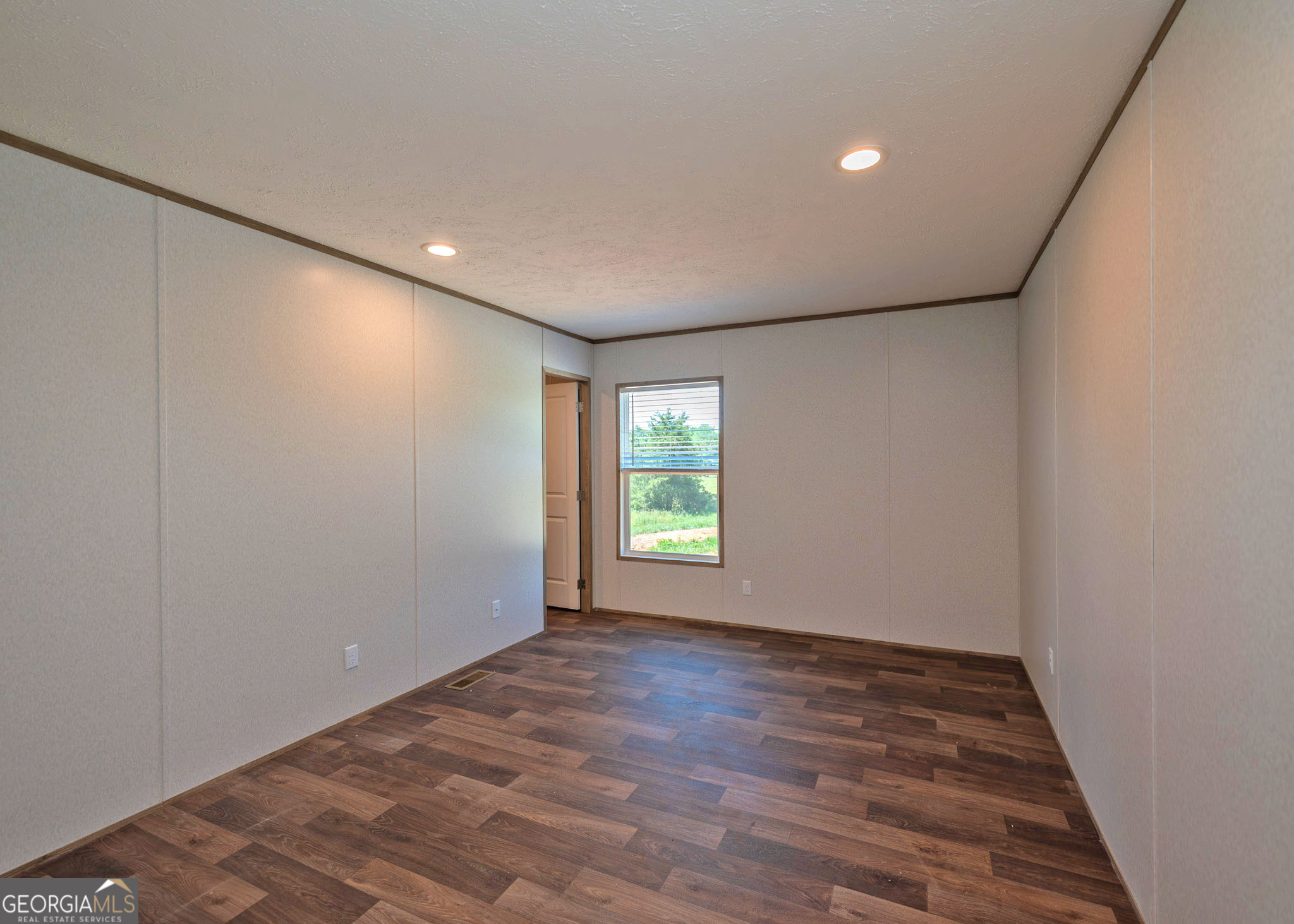 413 Griffin Road Martin, GA 30557 - Photo 21 of 31 a view of empty room with wooden floor