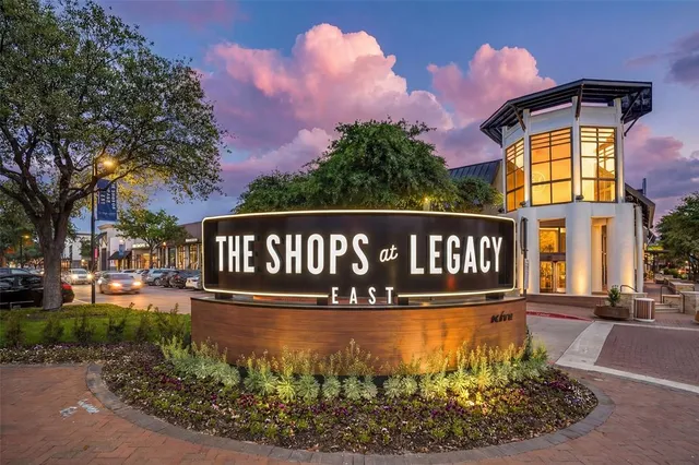 a view of a street with houses
