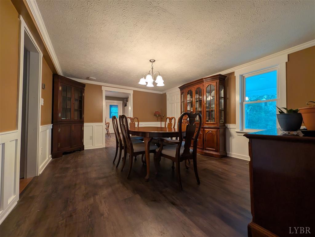 4470 Red Oak School Road Concord, VA 24538 - Photo 9 of 30 a view of a dining room with furniture and window