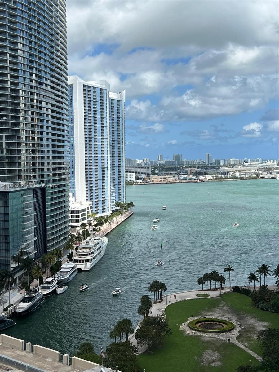 77 Southeast 5th Street, Unit 2015 Miami, FL 33131 - Photo 12 of 70 a view of a city with lawn chairs