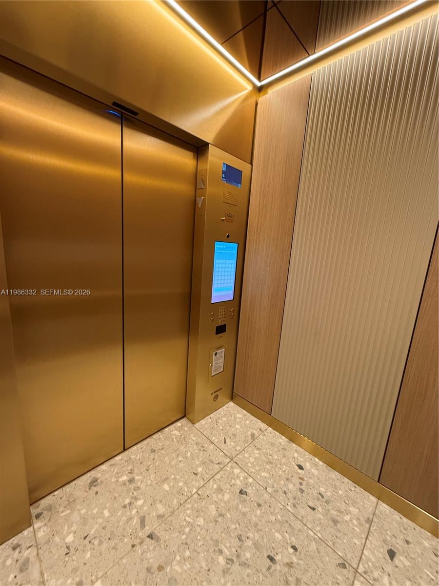 77 Southeast 5th Street, Unit 2015 Miami, FL 33131 - Photo 62 of 70 a bathroom with a shower and a sink