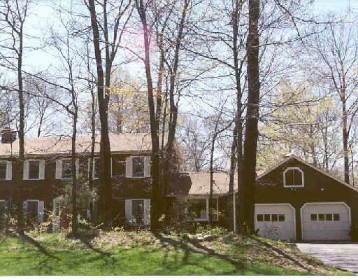 36 Rock Ridge Road Shelton, CT 06484 - Photo 1 of 1 a front view of a house with garden