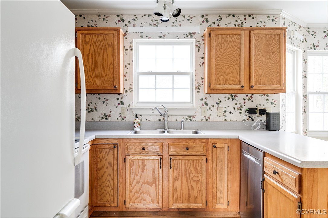 4588 Broad St Road Gum Spring, VA 23065 - Photo 13 of 50 a kitchen with granite countertop a sink window and cabinets