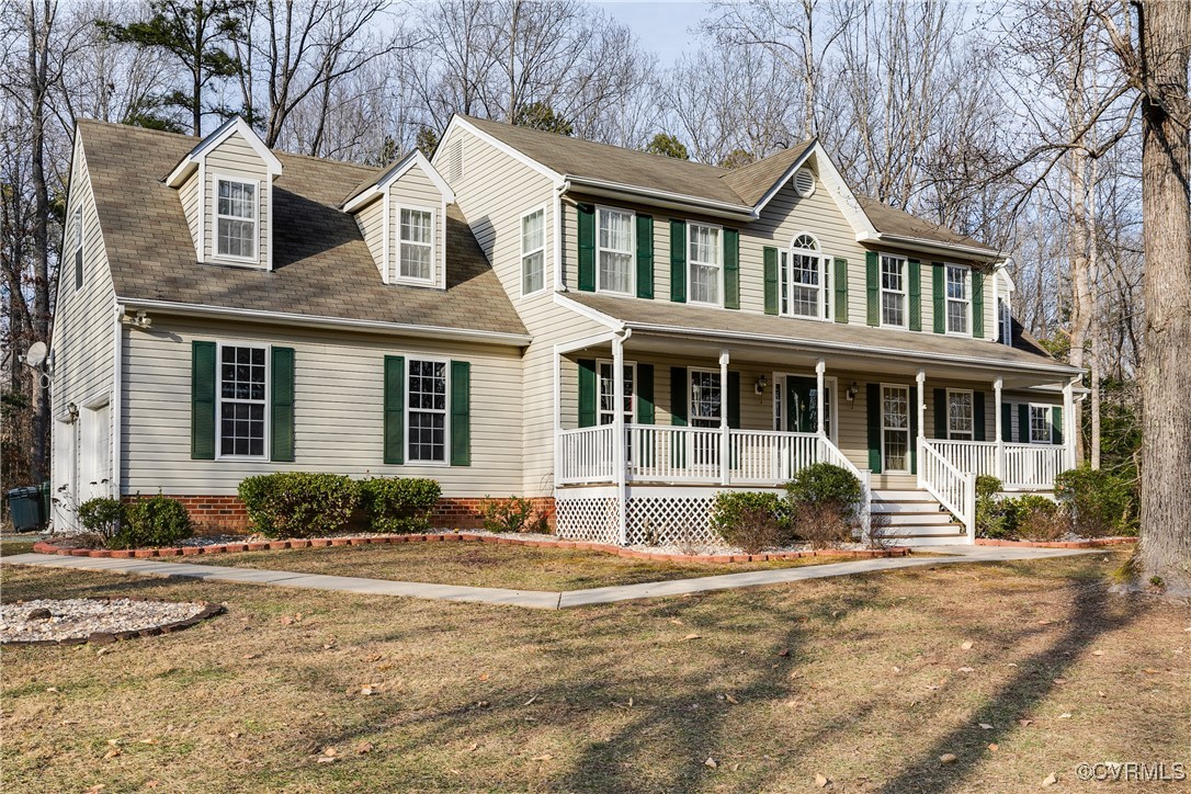 4588 Broad St Road Gum Spring, VA 23065 - Photo 2 of 50 a front view of a house with a yard