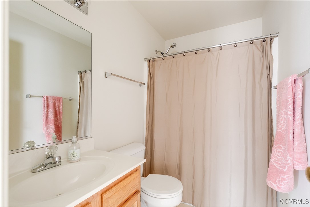 4588 Broad St Road Gum Spring, VA 23065 - Photo 27 of 50 a bathroom with a sink toilet and shower