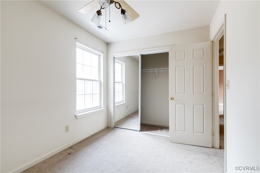 4588 Broad St Road Gum Spring, VA 23065 - Photo 36 of 50 an empty room with windows and cabinet